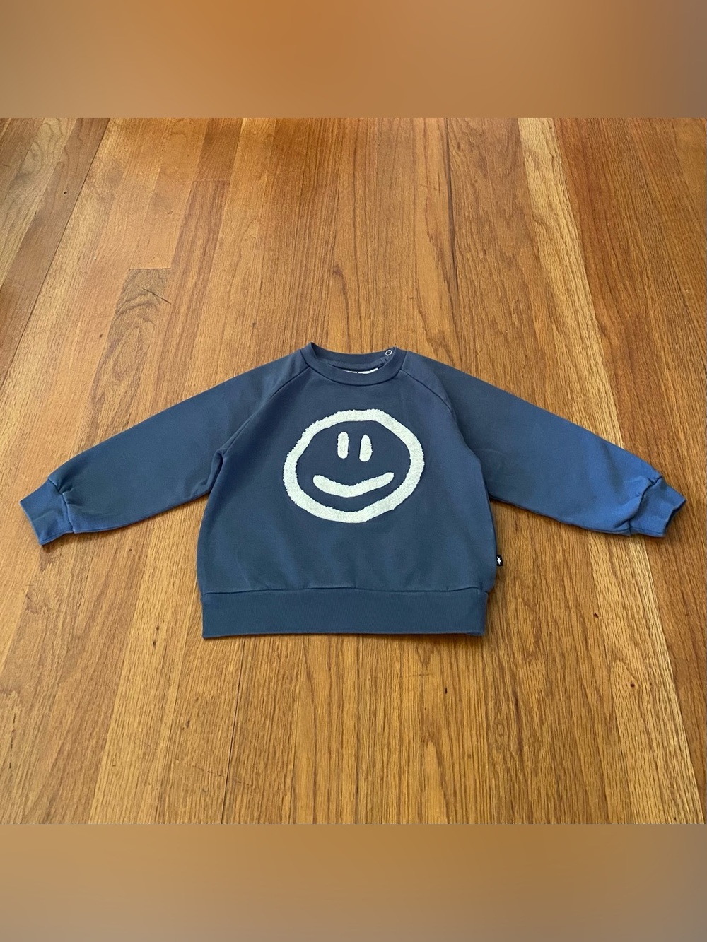 Molo Blue Sweatshirt with Cream Smiley Graphic